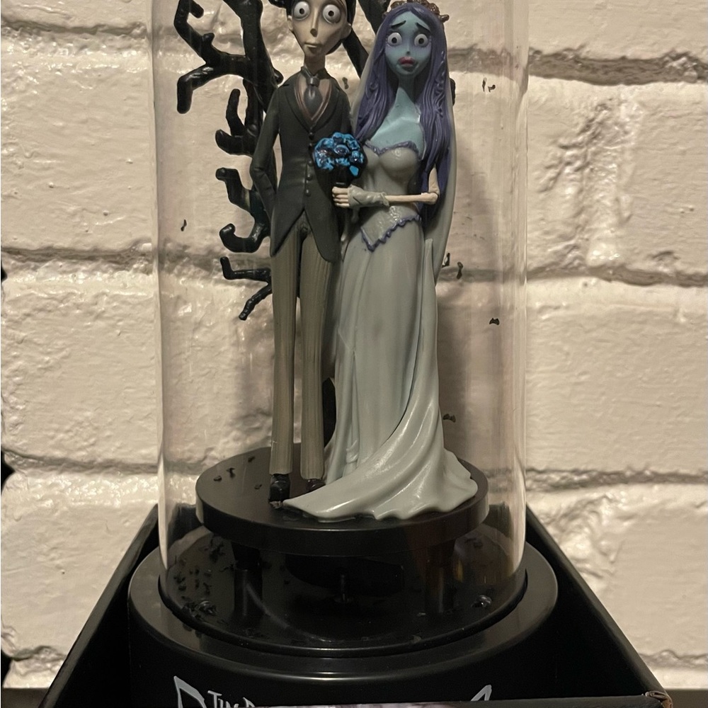Burton's Enchanting Couple Sculpture with Blue and Purple Details
